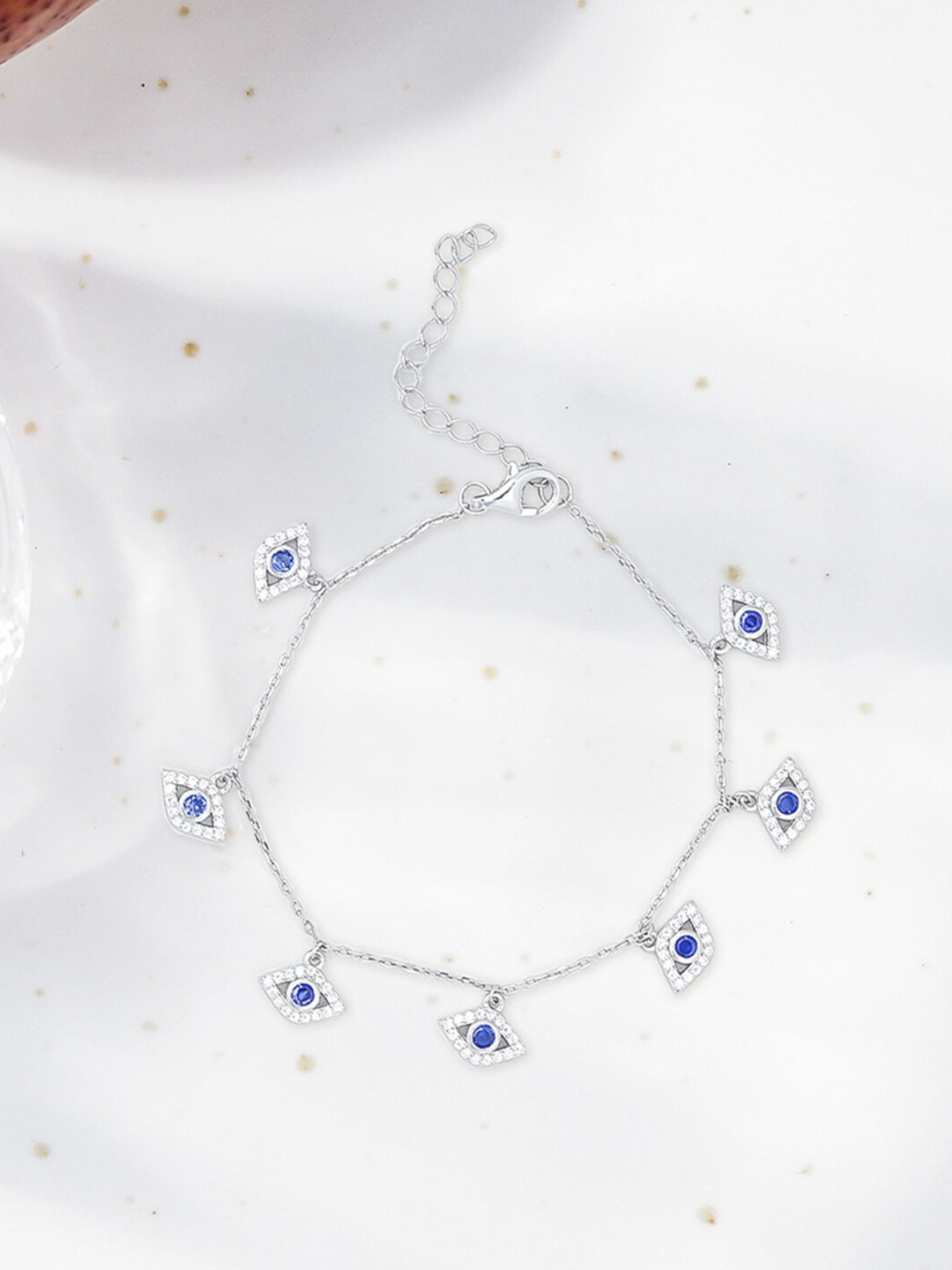 

Queen Be Women Silver-Toned & Blue Brass Charm Bracelet