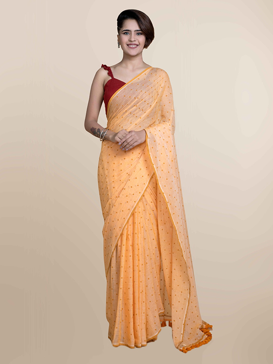 

Suta Peach & Mustard Yellow Polka Dots Printed Pure Cotton Saree