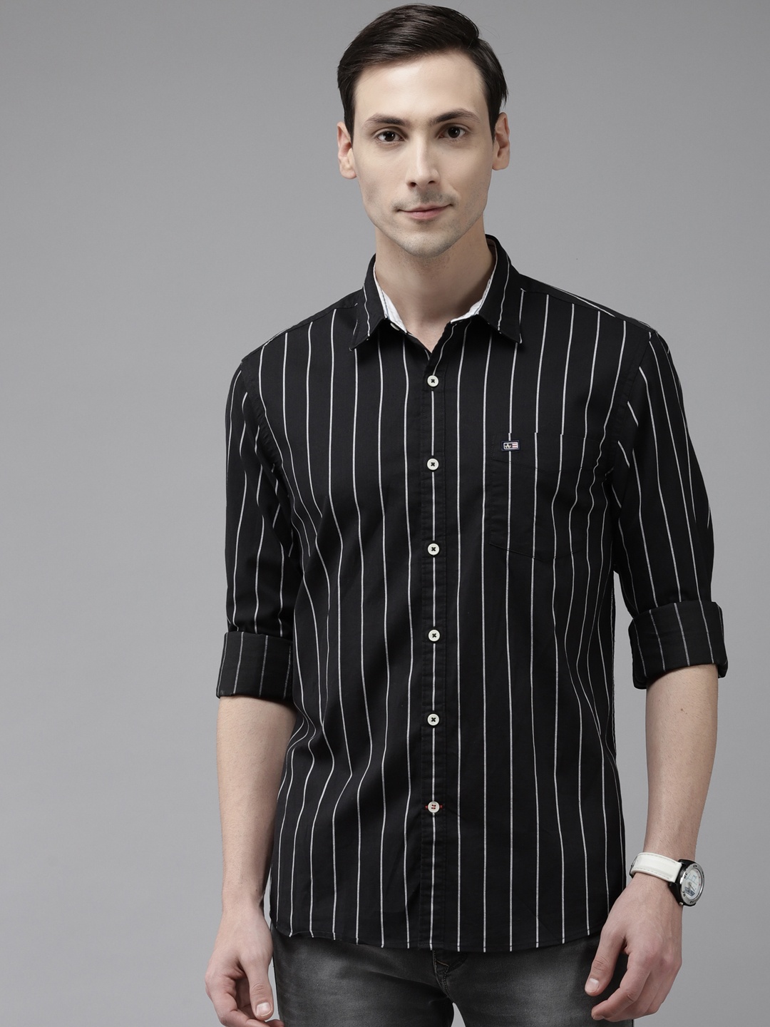 

Arrow Men Black & White Pure Cotton Slim Fit Striped Casual Shirt