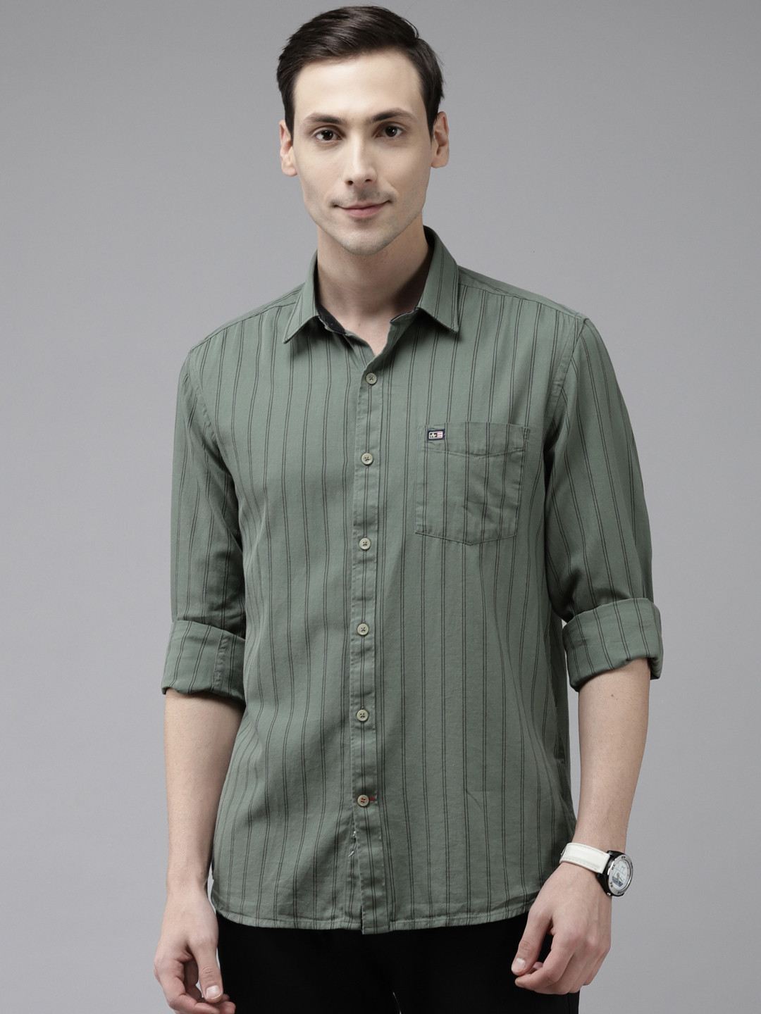 

Arrow Men Green & Black Pure Cotton Slim Fit Striped Casual Shirt