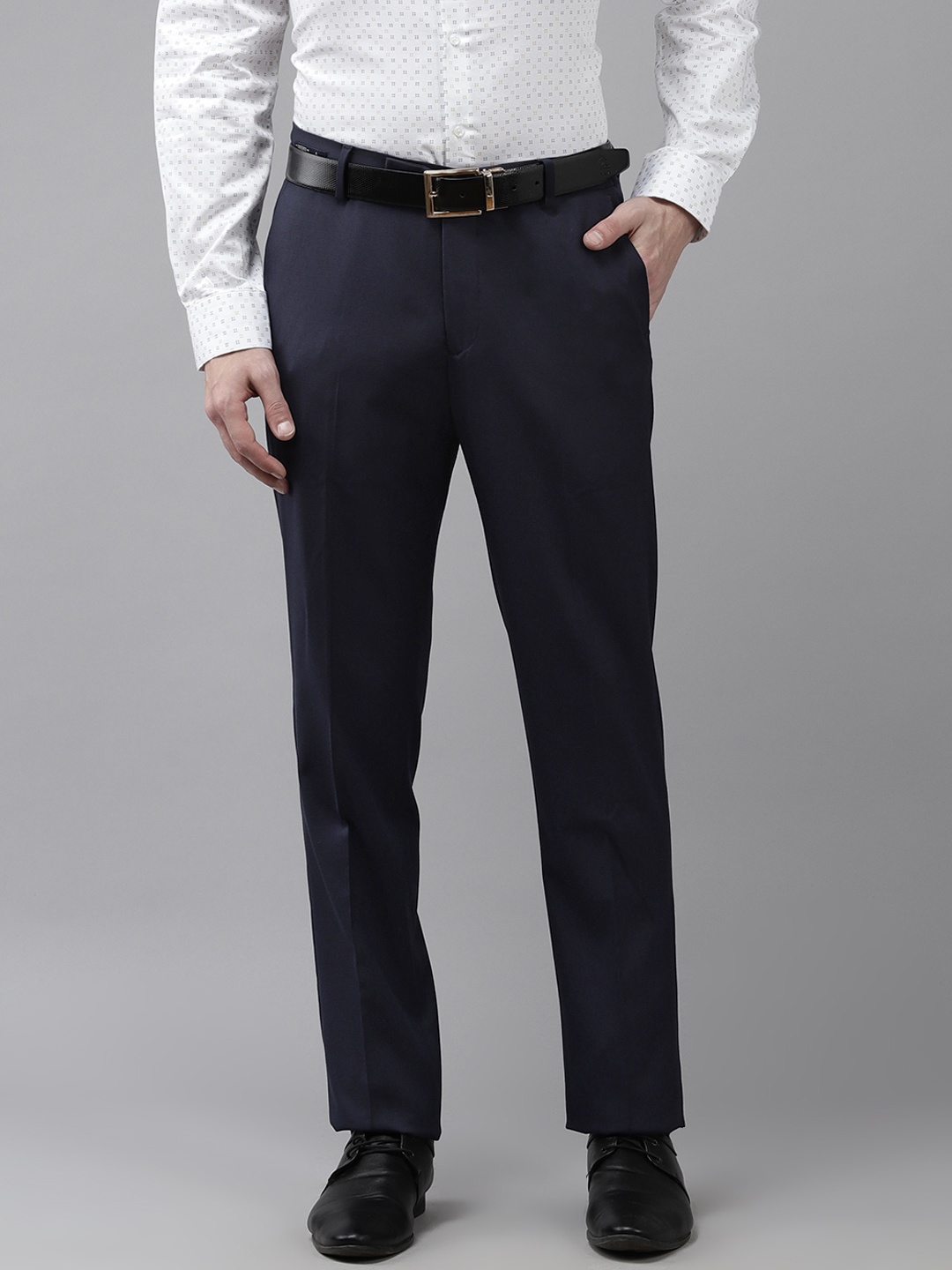 

Arrow Men Navy Blue Solid Tapered Fit Trousers