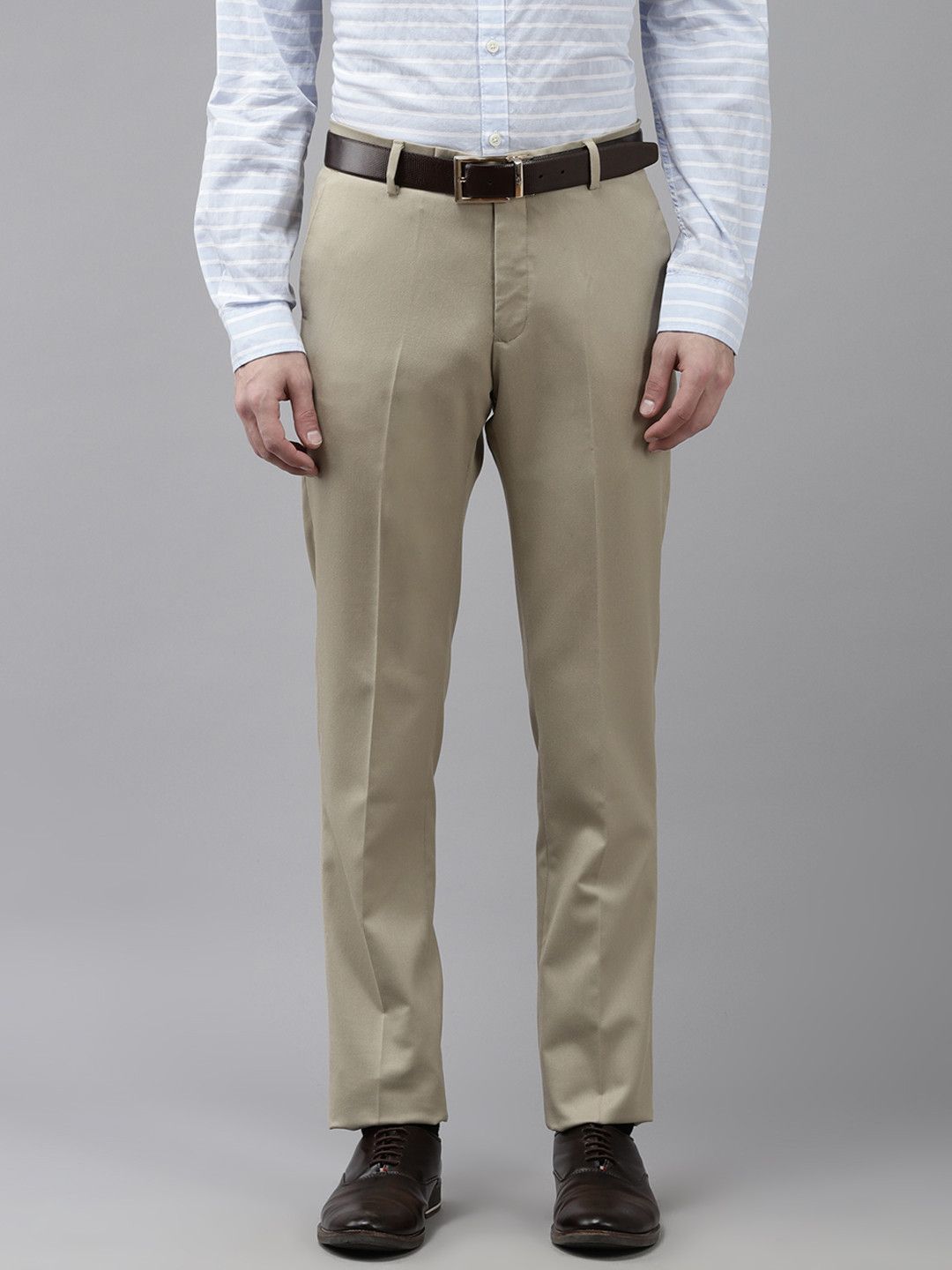 

Arrow Men Beige Solid Tapered Fit Trousers