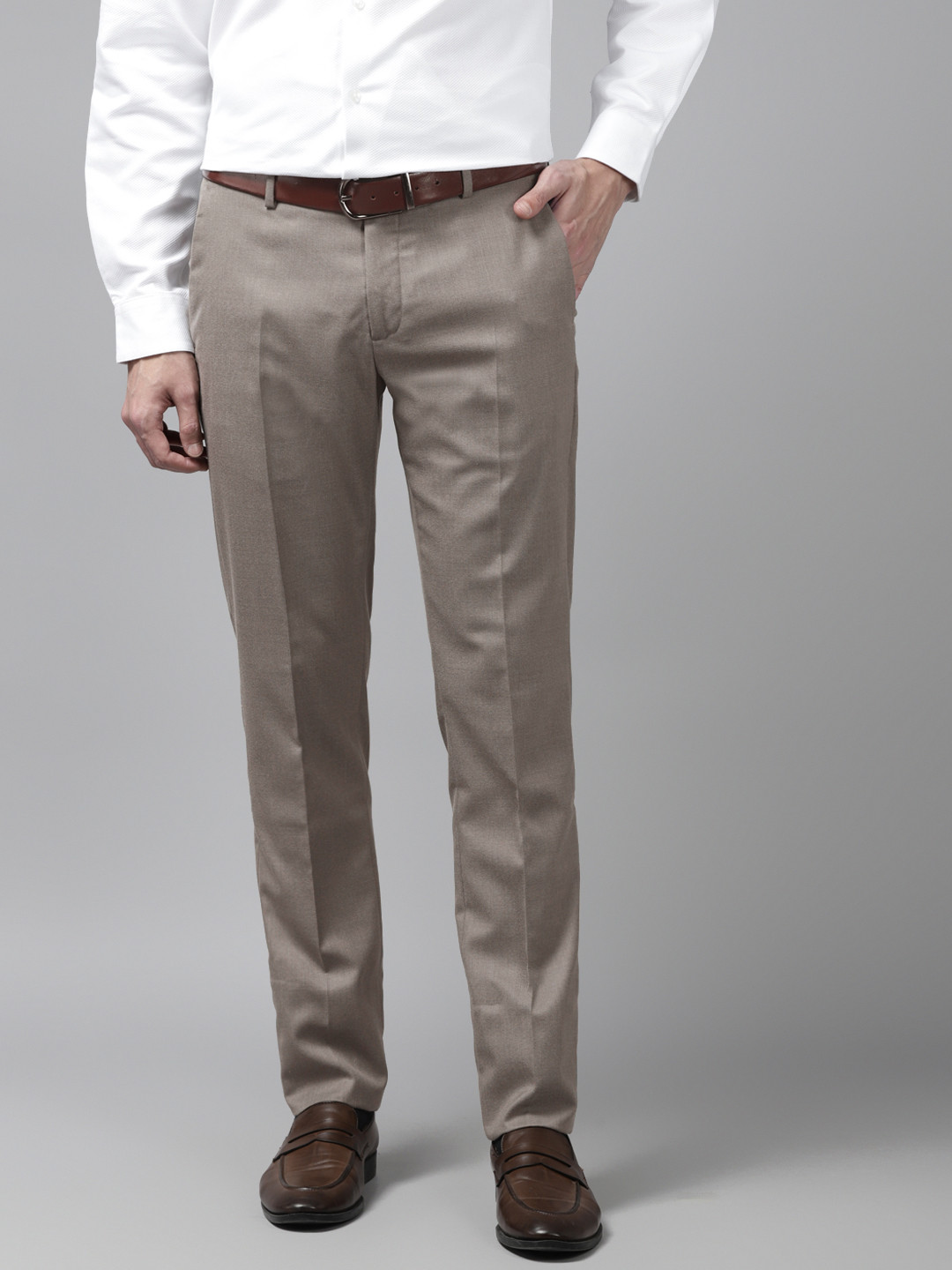 

Arrow Men Beige Solid Trousers