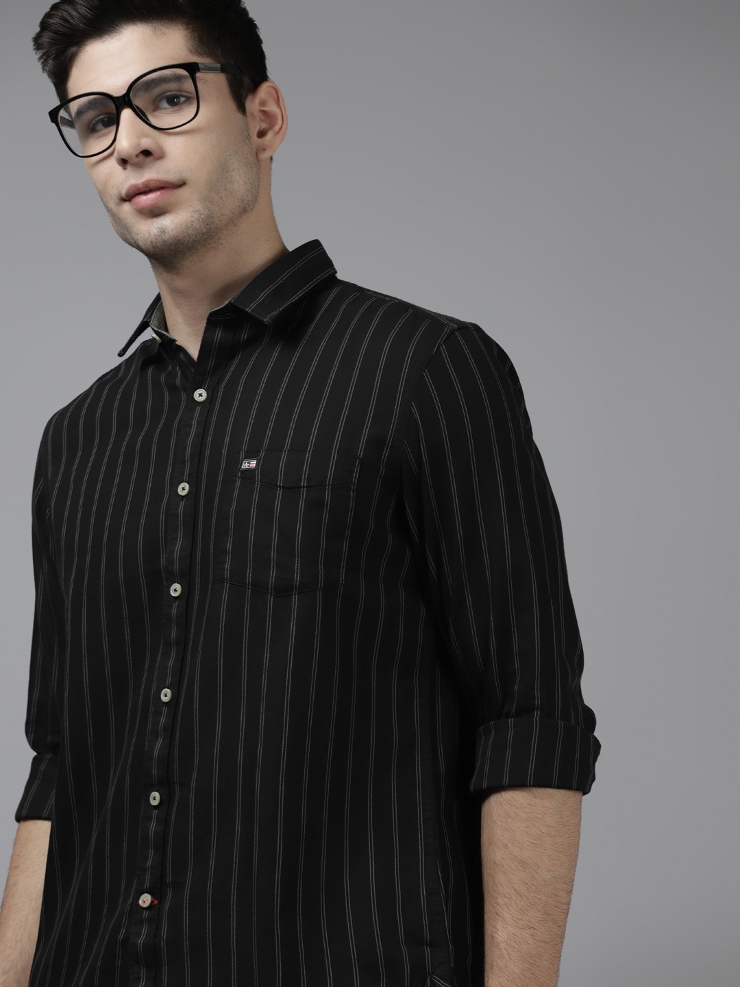 

Arrow Men Black Pure Cotton Slim Fit Striped Casual Shirt
