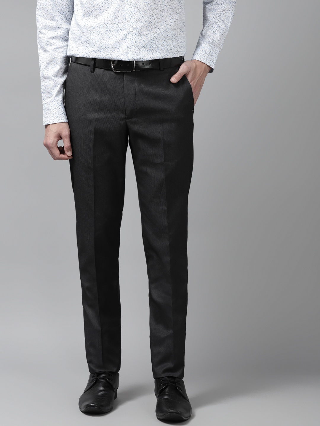 

Arrow Men Black Solid Tapered Fit Trousers