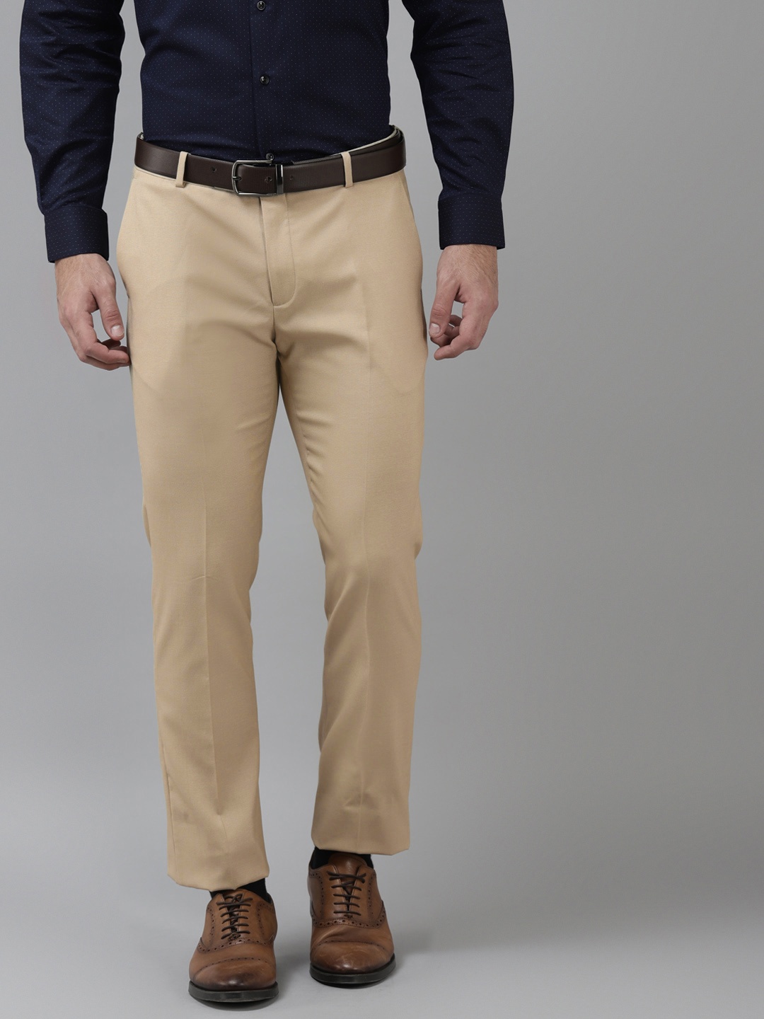 

Arrow Men Beige Hudson Tailored Fit Solid Formal Trousers