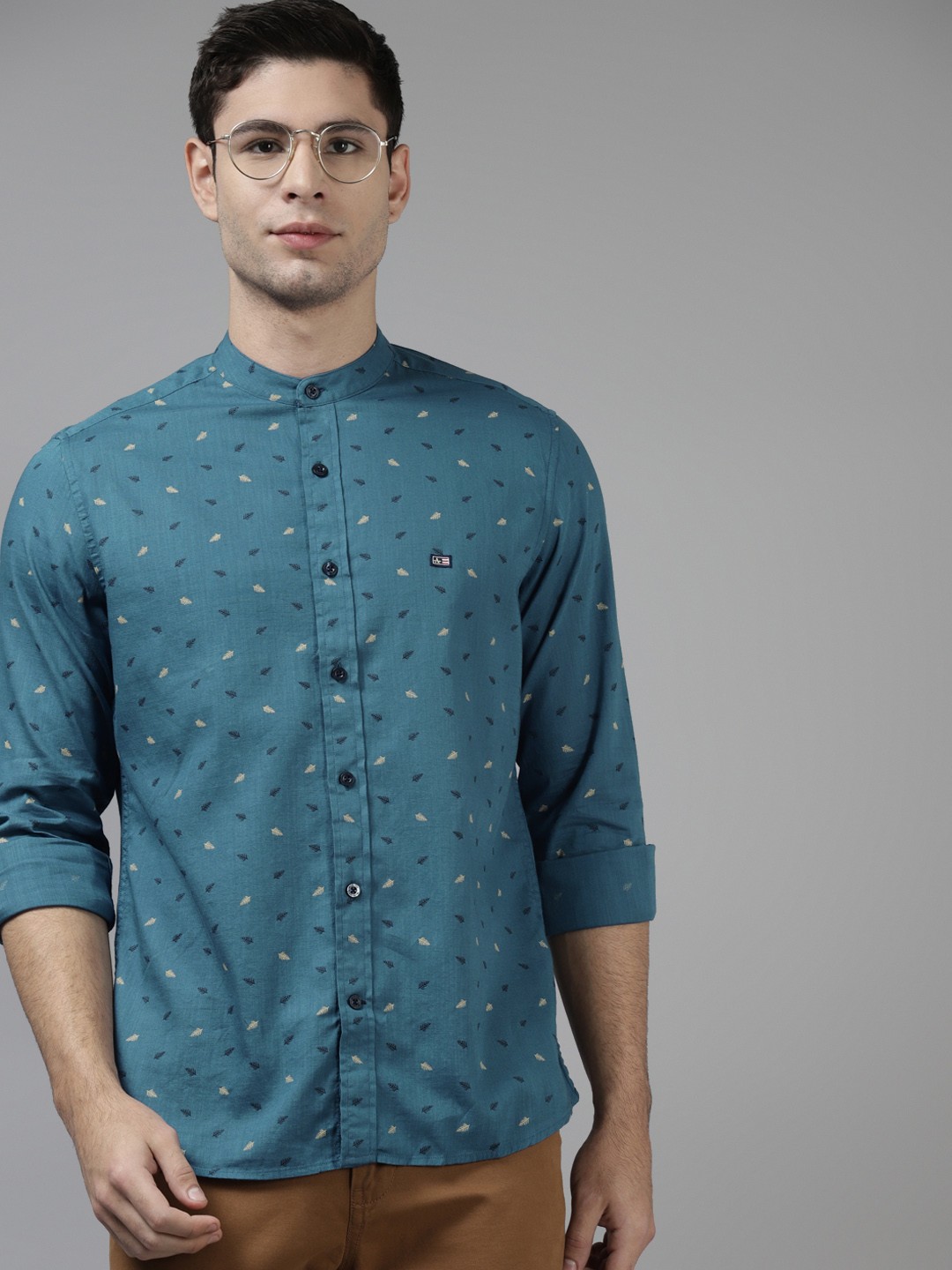 

Arrow Men Teal Blue Pure Cotton Slim Fit Printed Casual Shirt