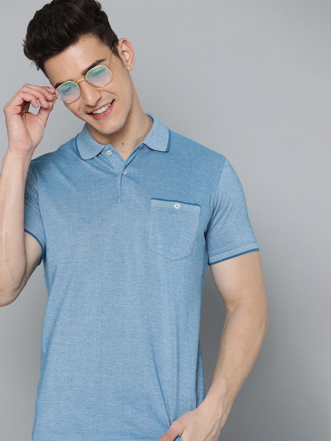

Mast & Harbour Men Blue Solid Polo Collar T-shirt with Chest Pocket