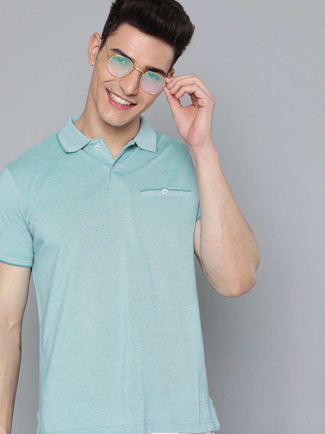 

Mast & Harbour Men Green Solid Polo Collar T-shirt with Pocket