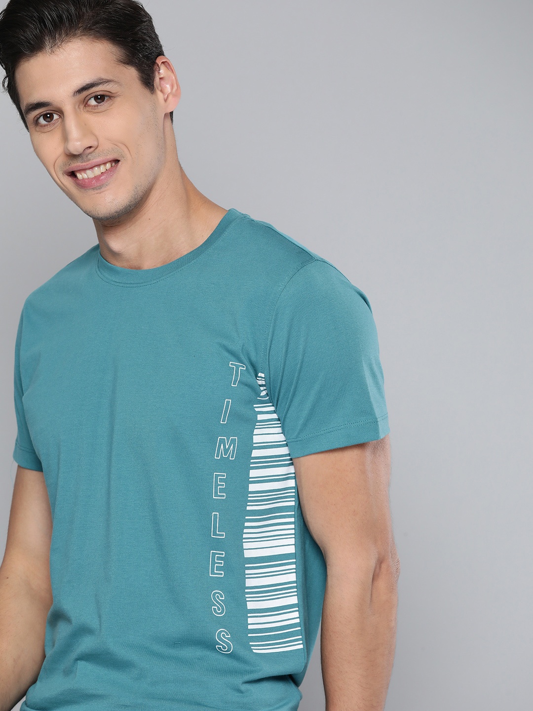 

Mast & Harbour Men Blue & White Typography Printed T-shirt