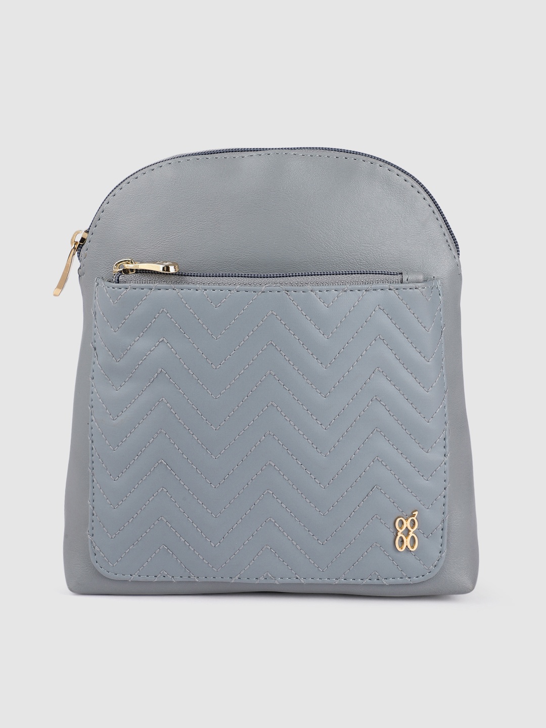 

Baggit Blue Geometric Textured LPXE MONDO E ASHLYN Structured Sling Bag Cum Backpack