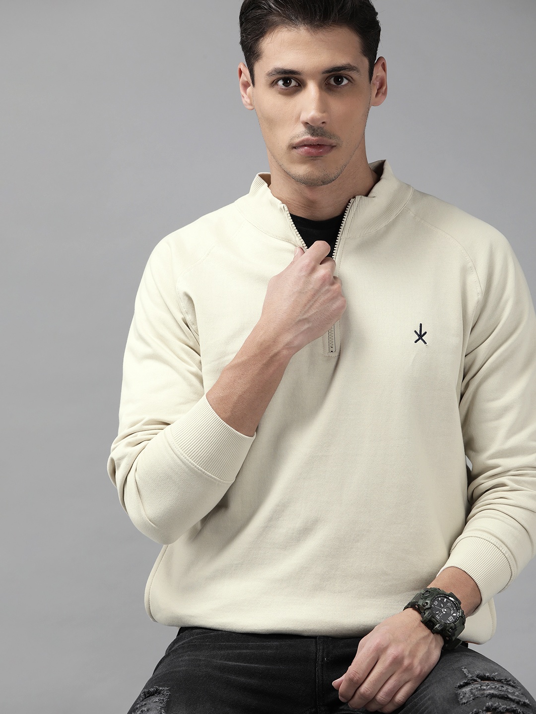 

The Roadster Lifestyle Co Men Cream-Coloured Solid Sweatshirt