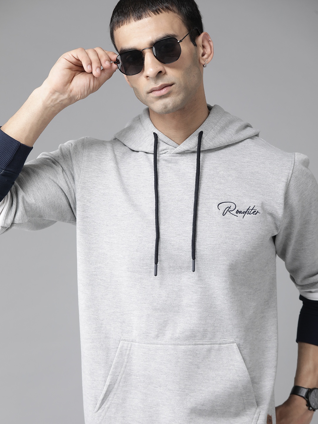 

The Roadster Lifestyle Co Men Grey Melange Solid Hooded Sweatshirt