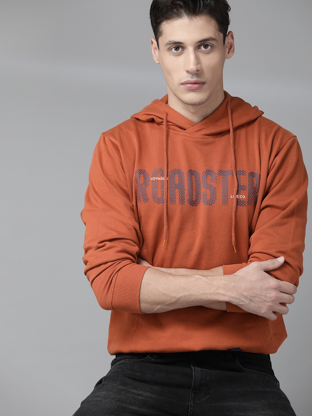 

The Roadster Lifestyle Co Men Rust Orange Printed Hooded Sweatshirt