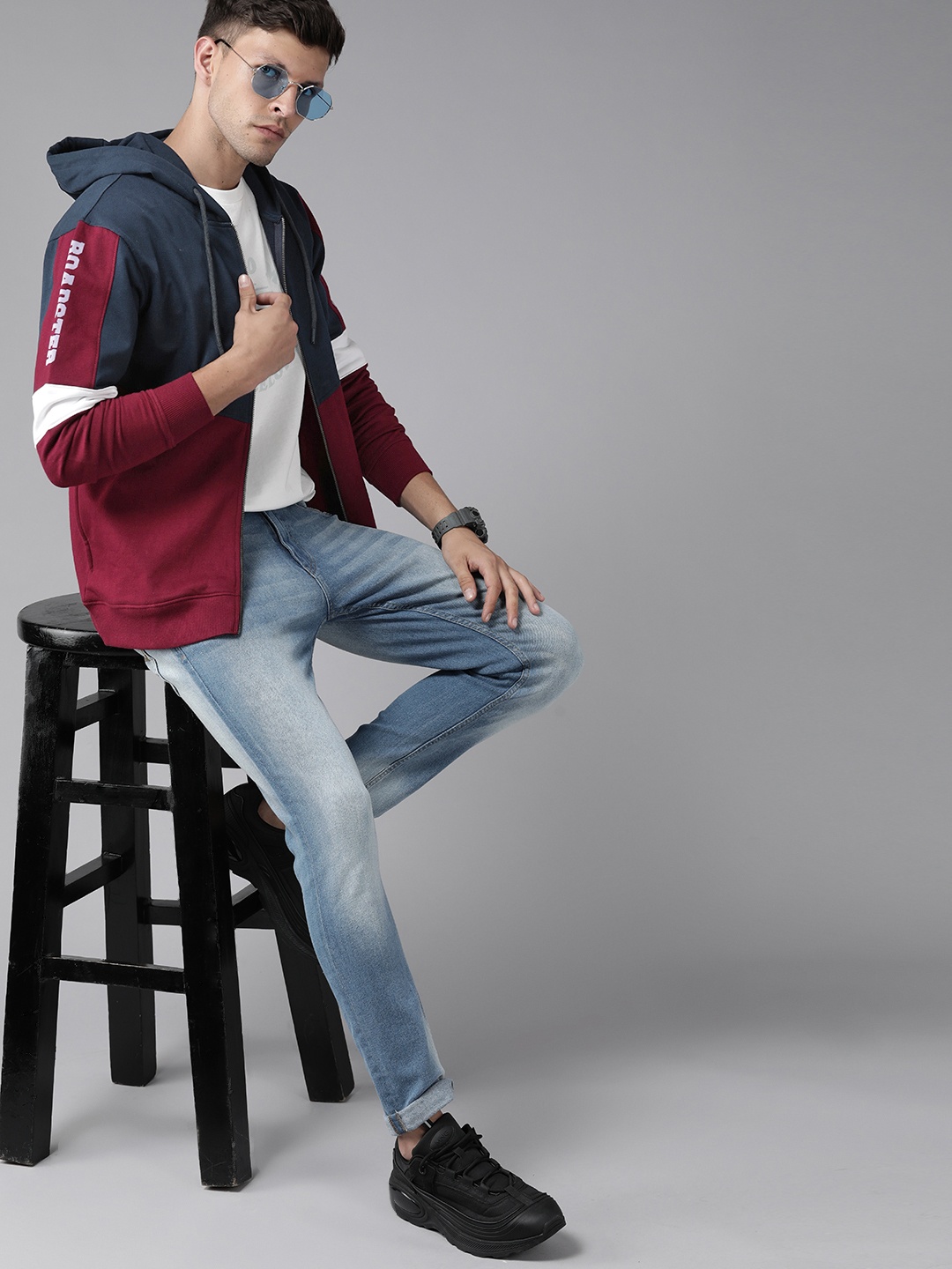 

Roadster Men Navy Blue Colourblocked Hooded Sweatshirt