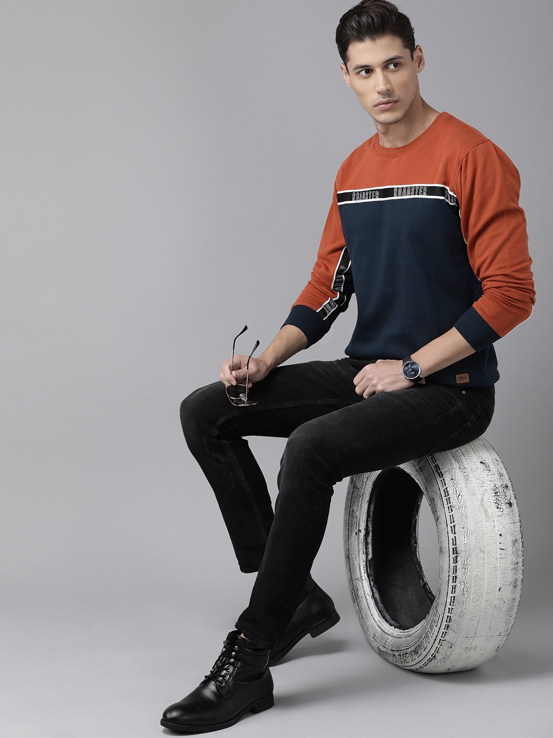 

The Roadster Lifestyle Co Men Navy Blue & Rust Orange Colourblocked Brand Logo Taping Detail Sweatshirt