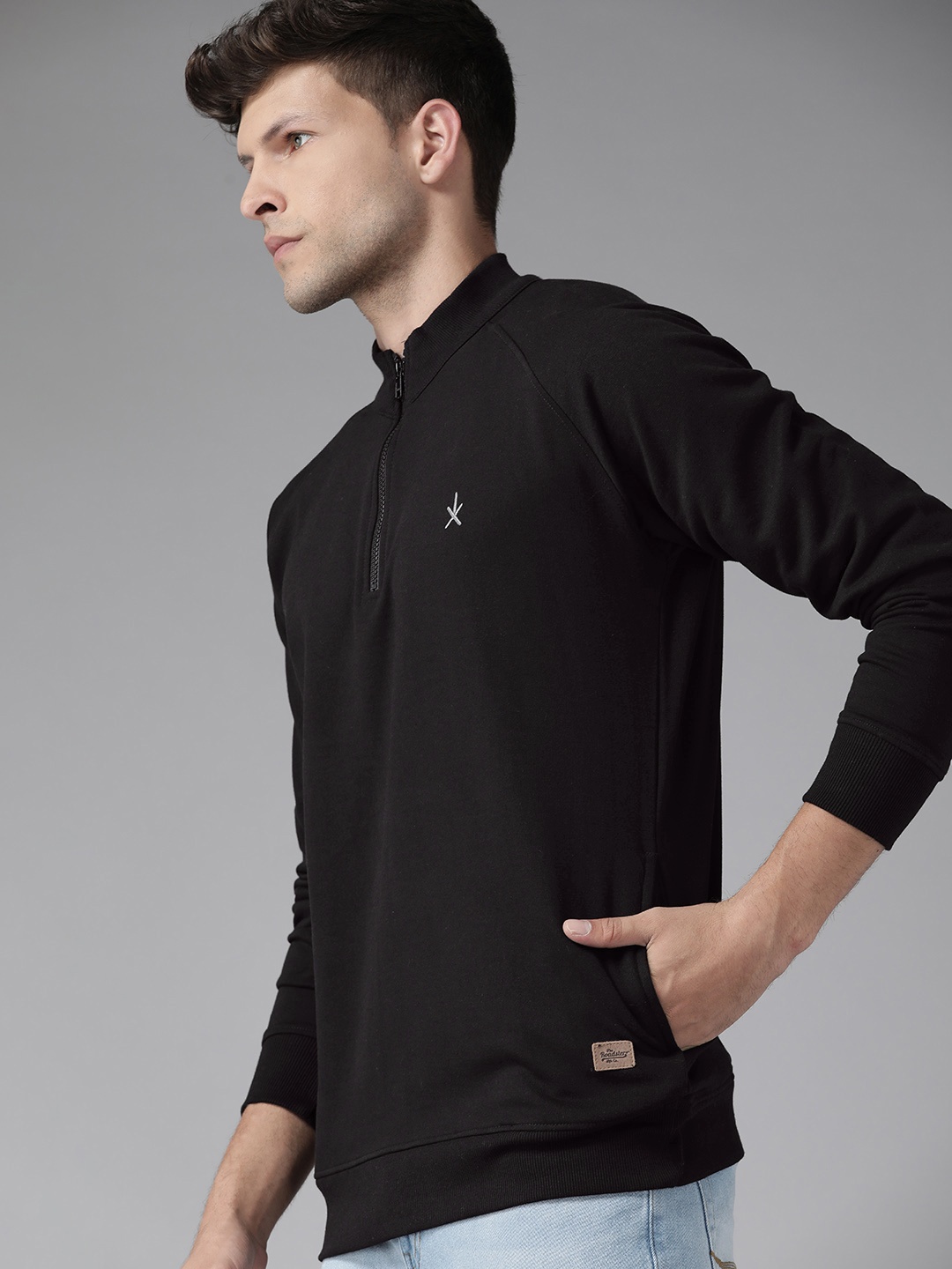 

Roadster Men Black Solid Sweatshirt