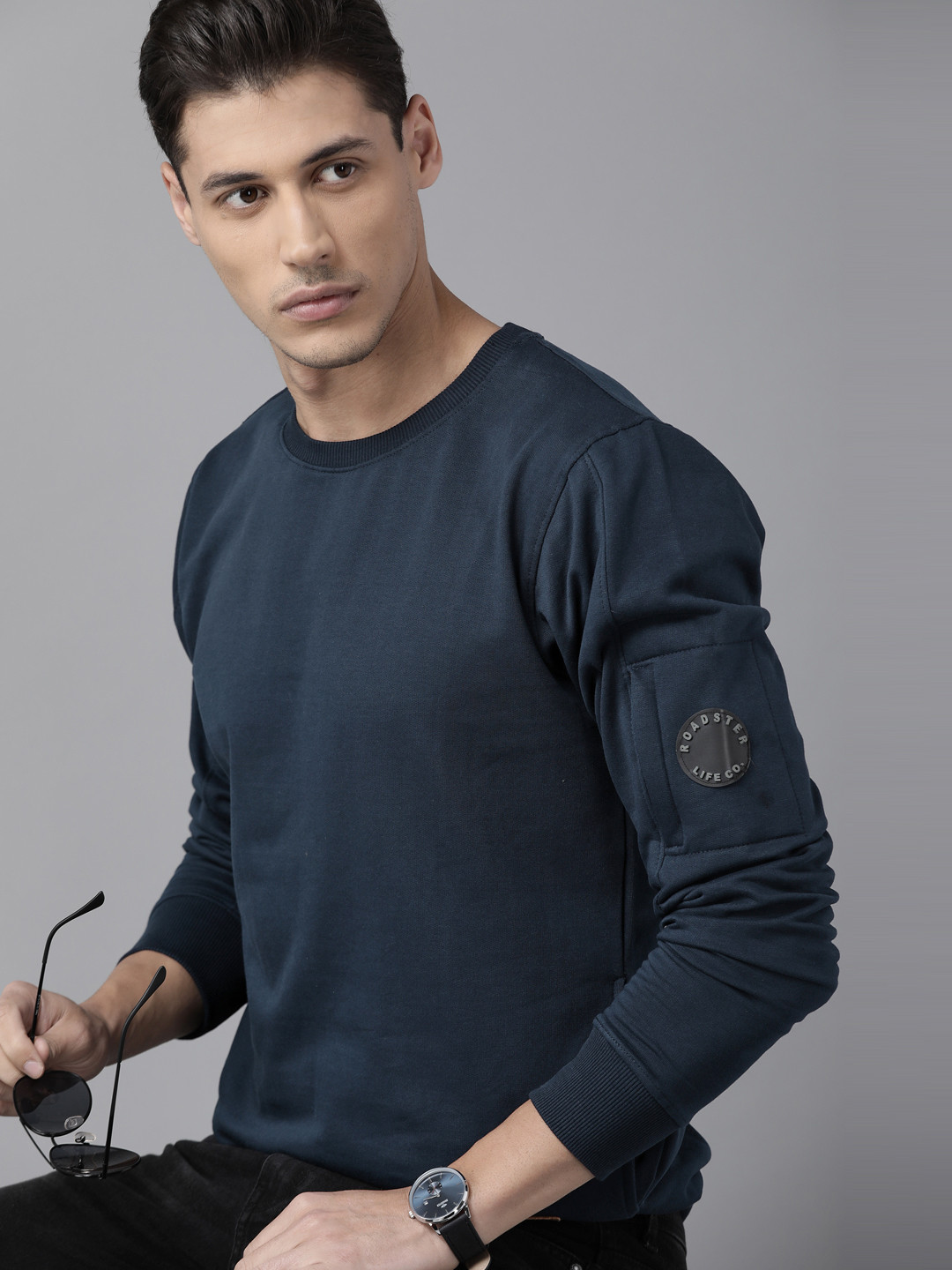 

The Roadster Lifestyle Co Men Navy Blue Solid Sweatshirt