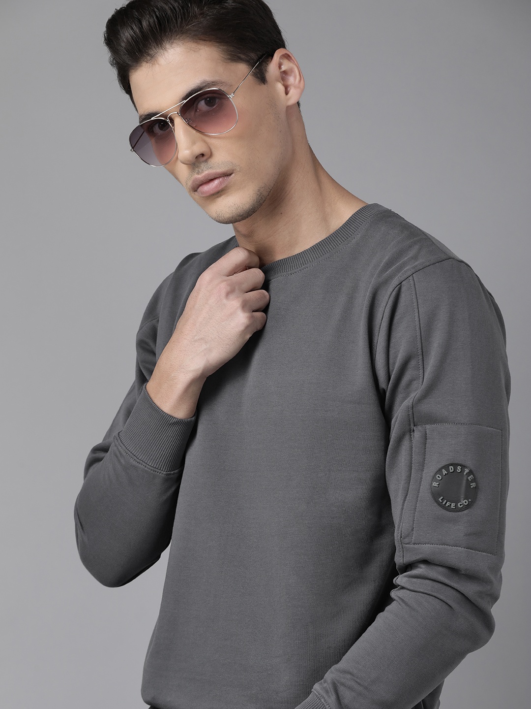 

The Roadster Lifestyle Co Men Grey Solid Sweatshirt