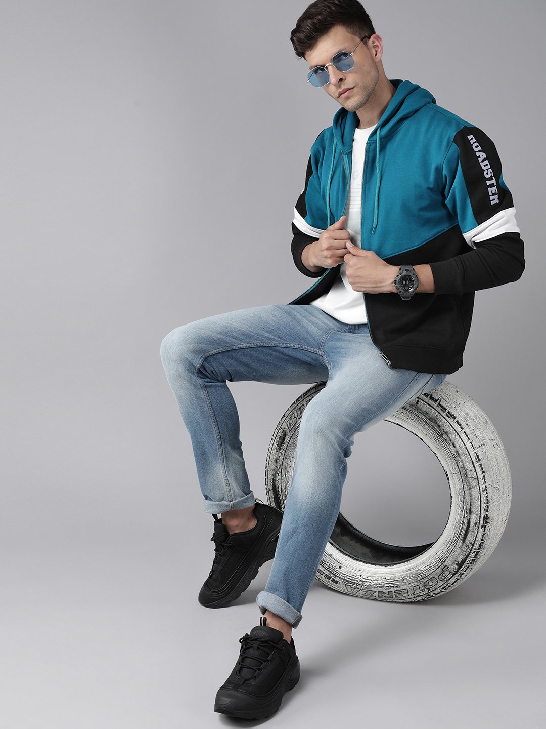 

Roadster Men Teal Colourblocked Hooded Sweatshirt
