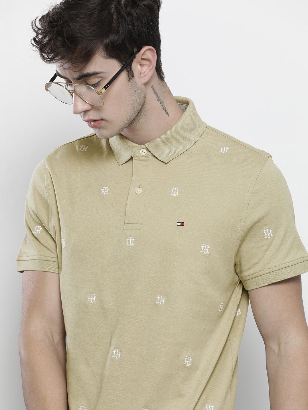 

Tommy Hilfiger Men Beige & White Printed Polo Collar T-shirt