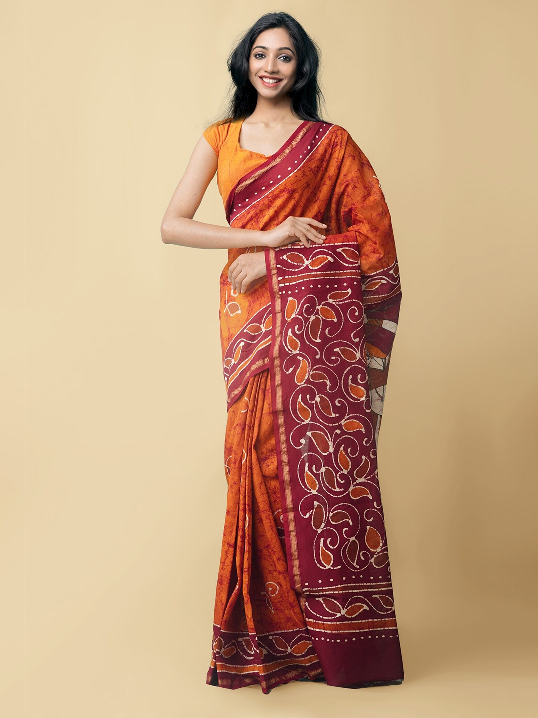 

Unnati Silks Orange & Maroon Batik Silk Cotton Block Print Saree