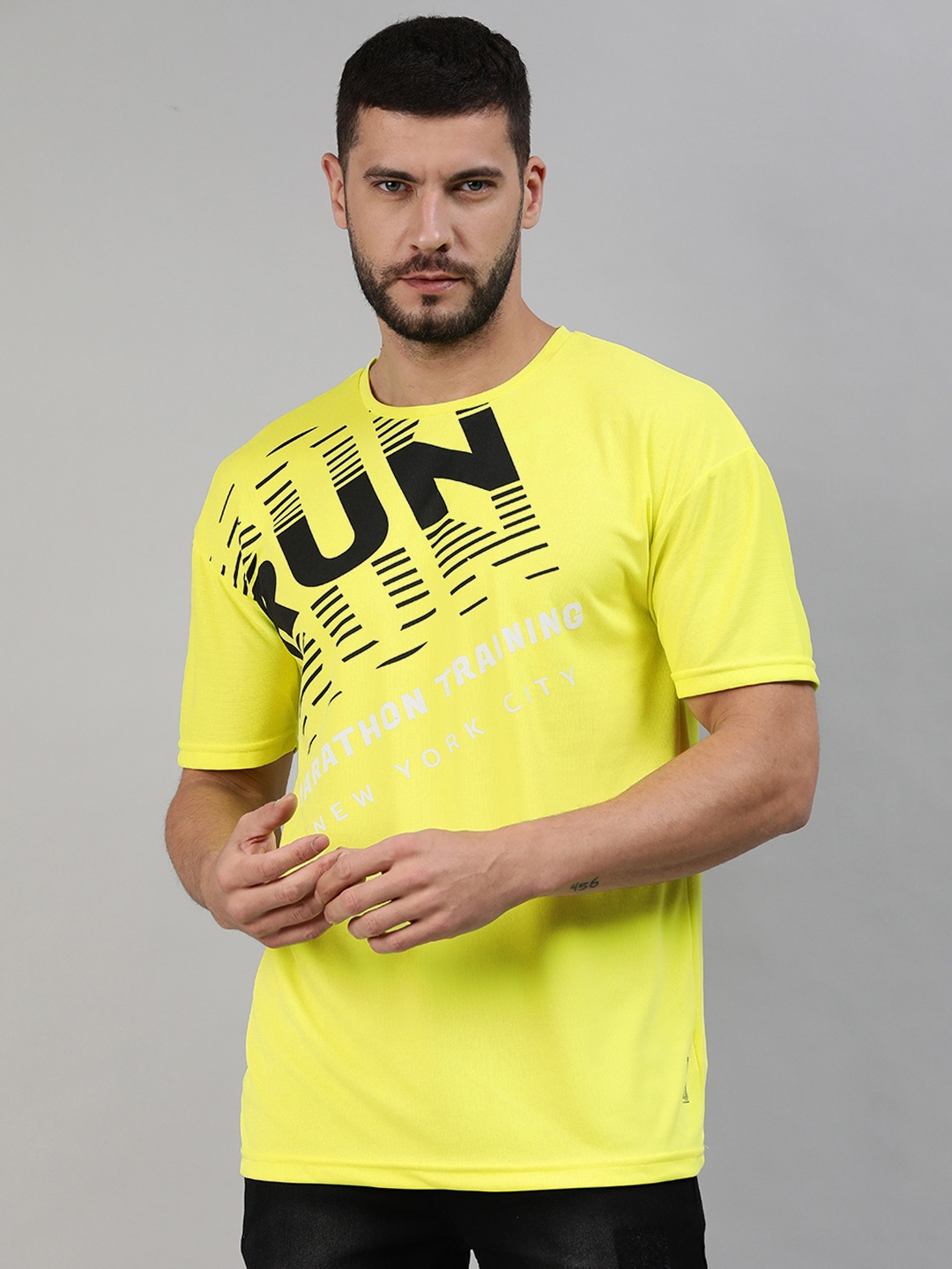 

abof Men Yellow & Black Typography Printed Pure Cotton Round Neck T-shirt