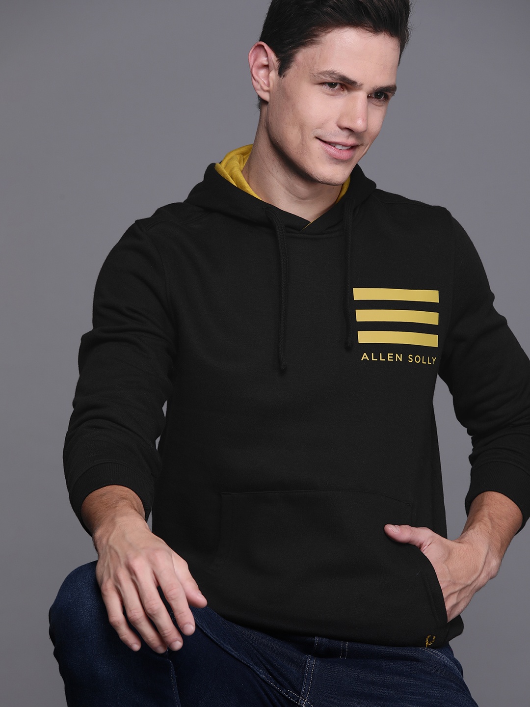 

Allen Solly Men Black Solid Hooded Sweatshirt With Stripe Detail