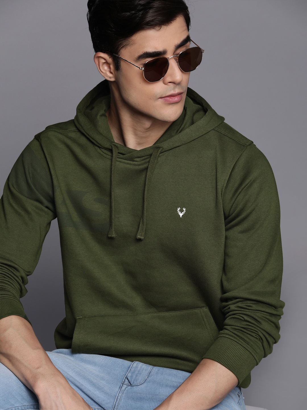 

Allen Solly Men Olive Green Solid Hooded Sweatshirt