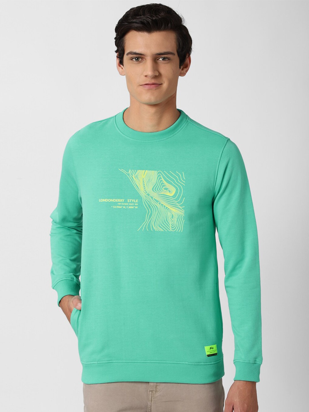 

Peter England Casuals Men Green Printed Sweatshirt