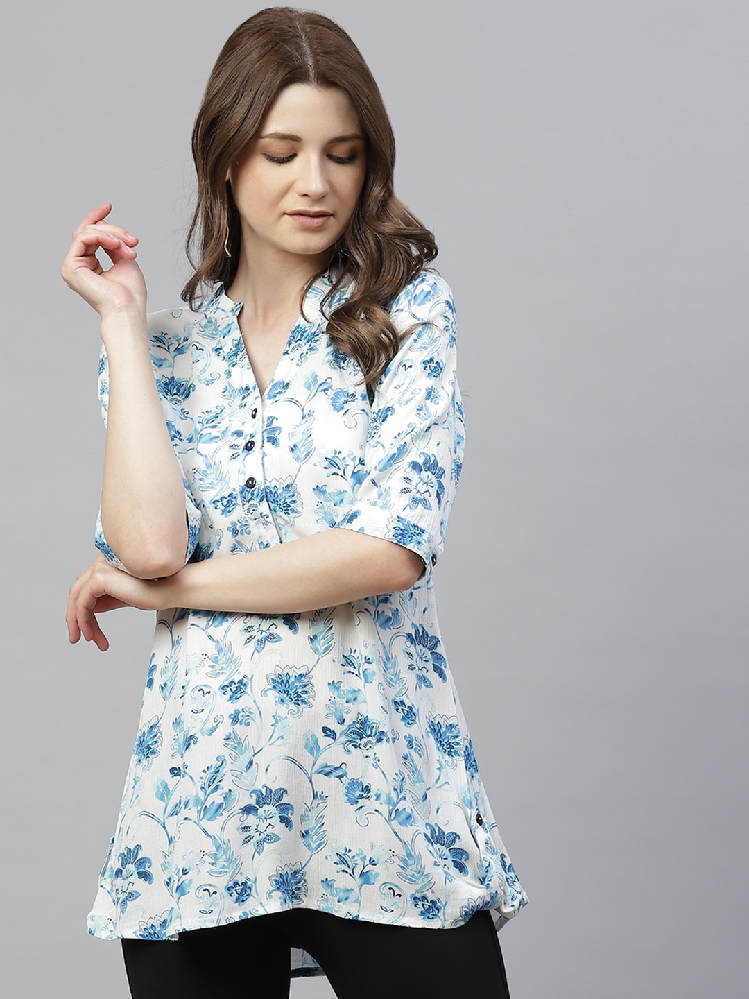 

Ayaany Women White & Blue Floral Printed Mandarin Collar A-Line Top