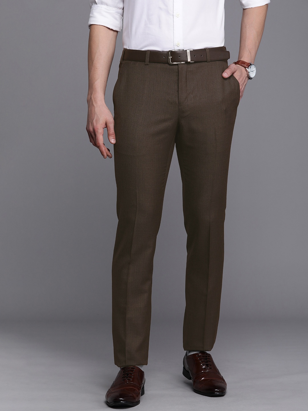 

Raymond Men Brown Solid Mid-Rise Slim Fit Formal Trousers
