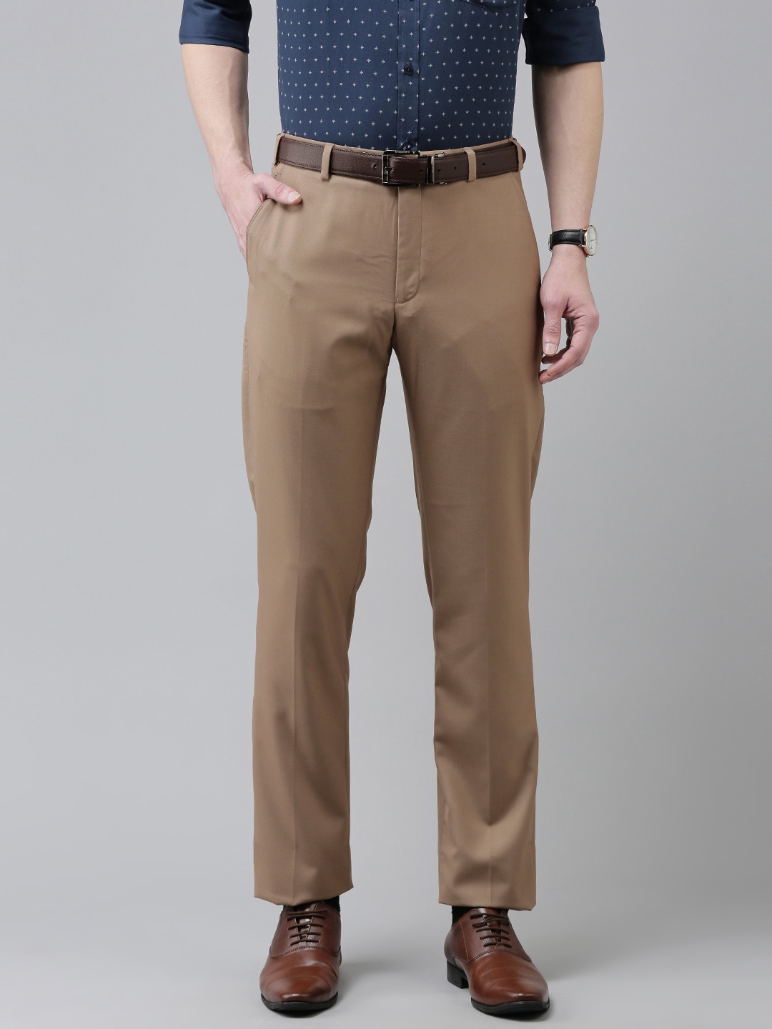 

Park Avenue Men Khaki Solid Regular Fit Mid-Rise Plain Woven Flat-Front Formal Trousers