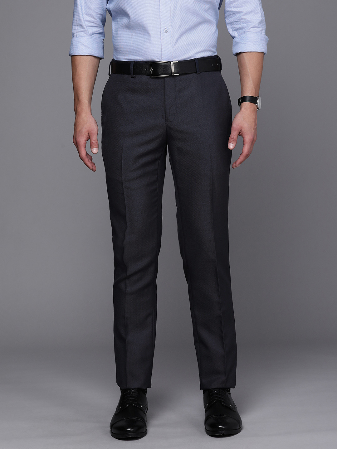 

Raymond Men Navy Blue Solid Slim Fit Mid-Rise Formal Trousers