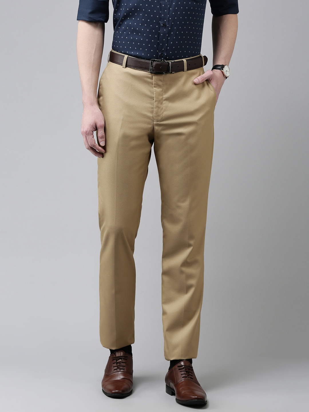 

Park Avenue Men Khaki Solid Regular Fit Mid-Rise Plain Woven Flat-Front Formal Trousers