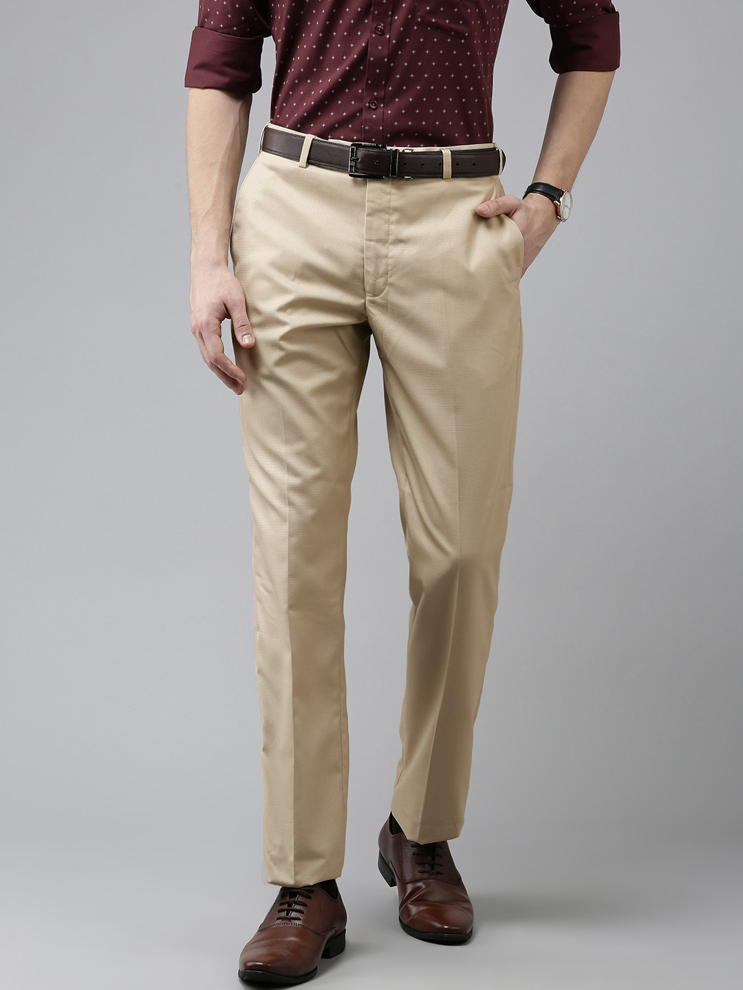 

Park Avenue Men Beige Solid Mid-Rise Formal Trousers