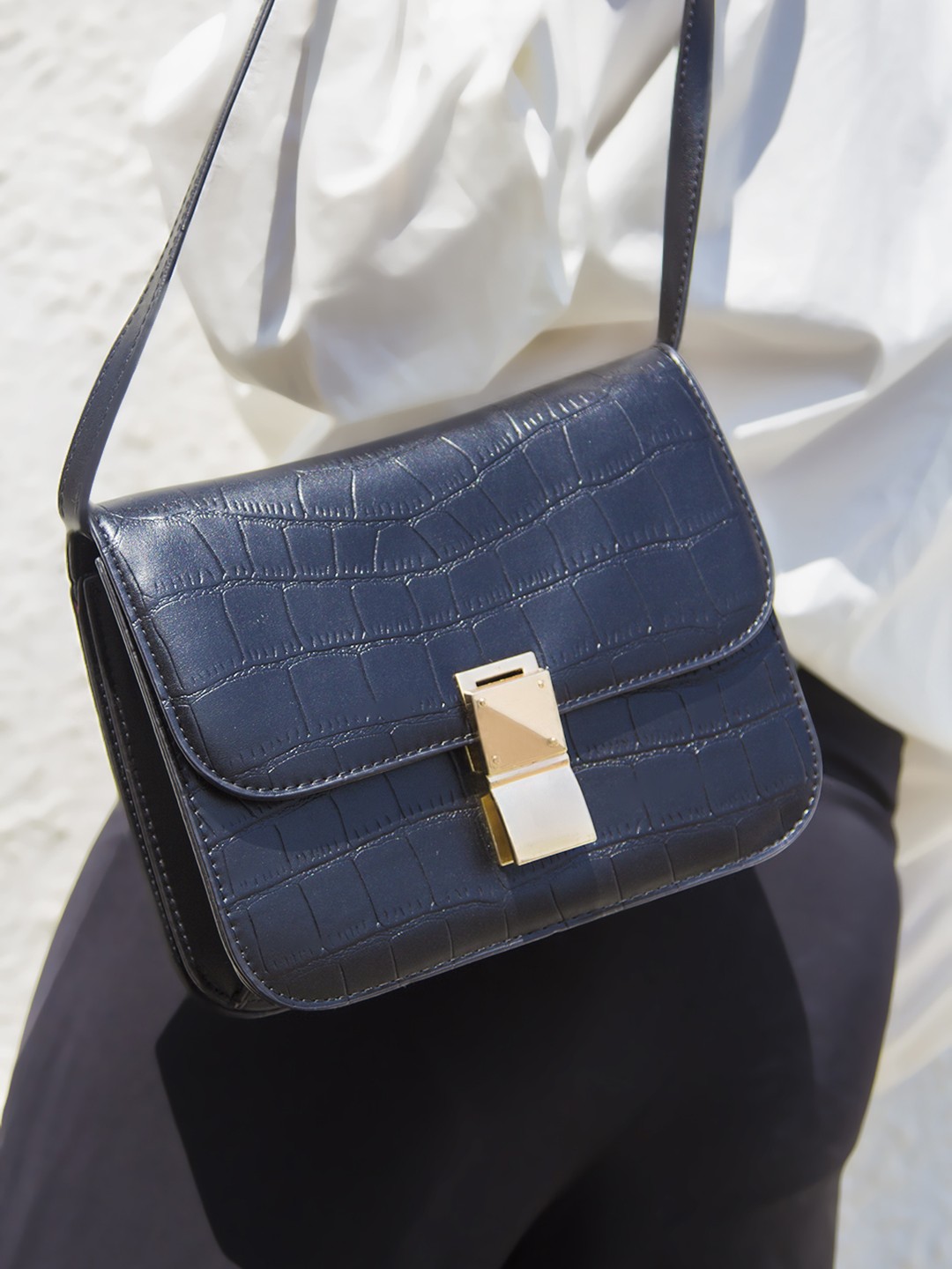 

Kazo Black PU Structured Sling Bag with Bow Detail