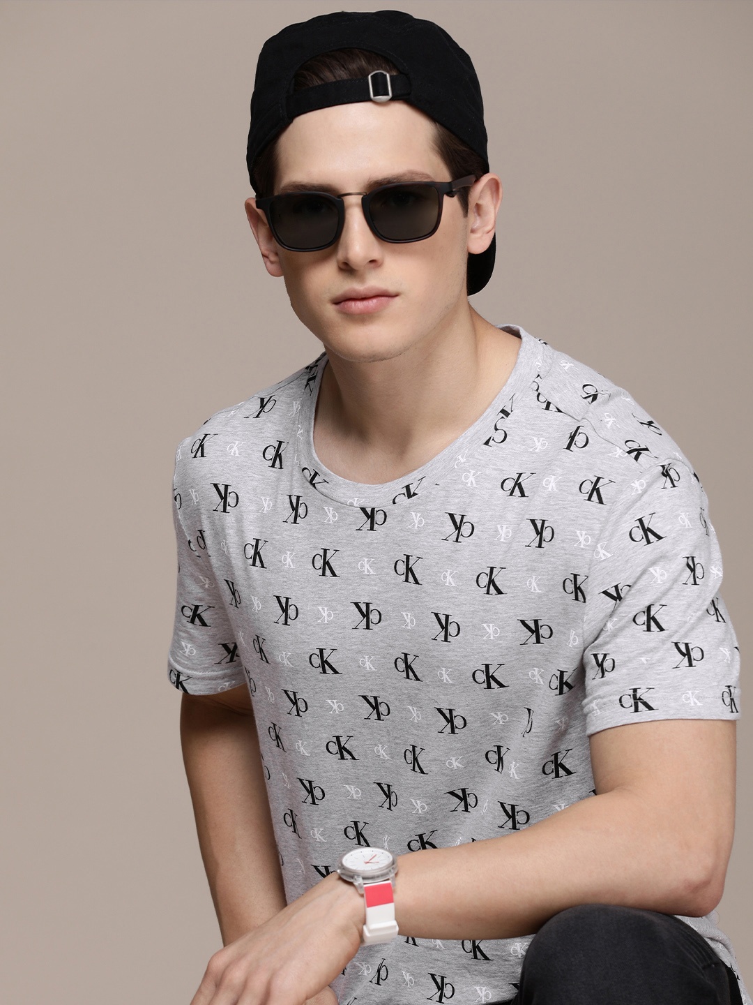 

Calvin Klein Jeans Men Grey Melange & Black Brand Logo Printed Pure Cotton T-shirt