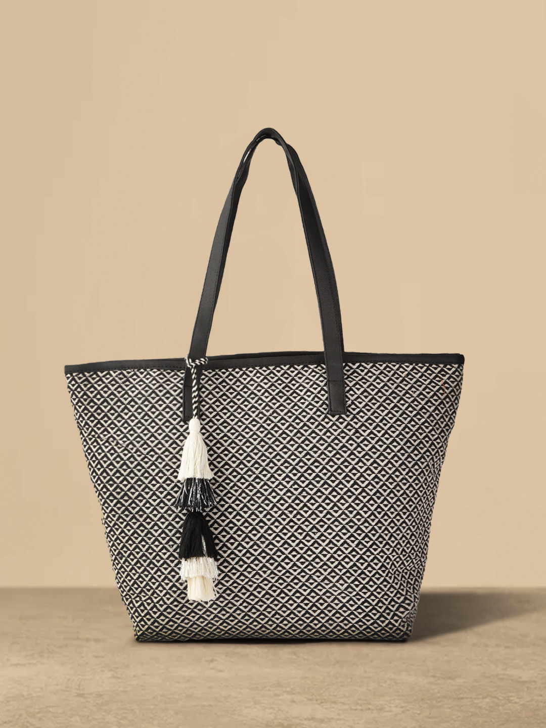 

Anouk Black & Off-White Jacquard Woven Design Shoulder Bag with Tassel