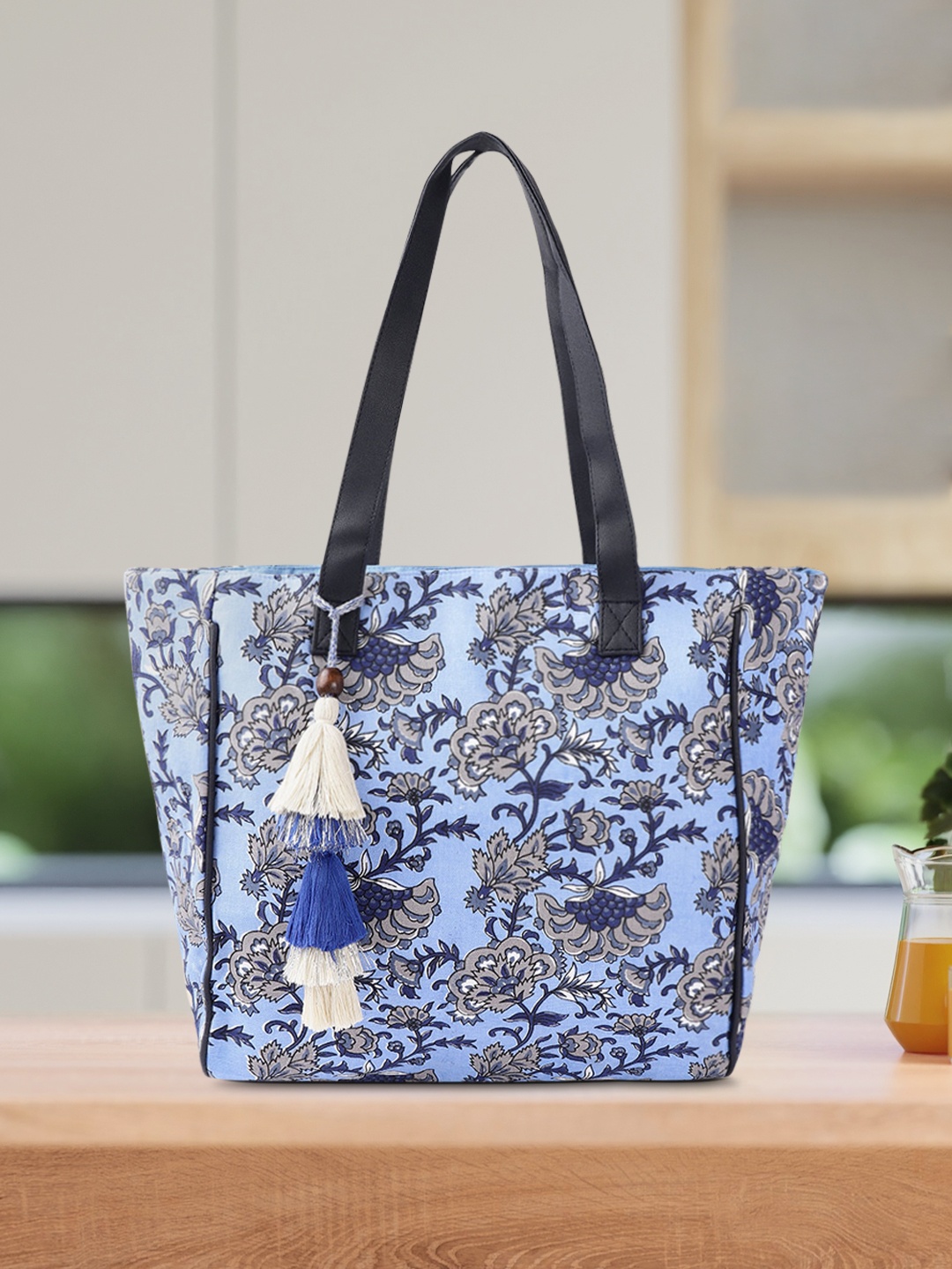 

Sangria Blue & Grey Floral Printed Shoulder Bag with Tasselled