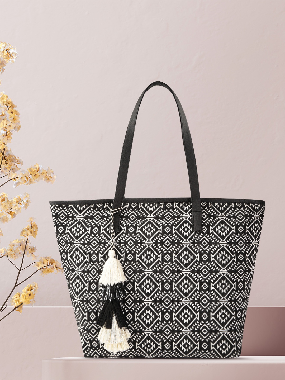 

Anouk Black & Off-White Jacquard Woven Design Shoulder Bag with Tasselled