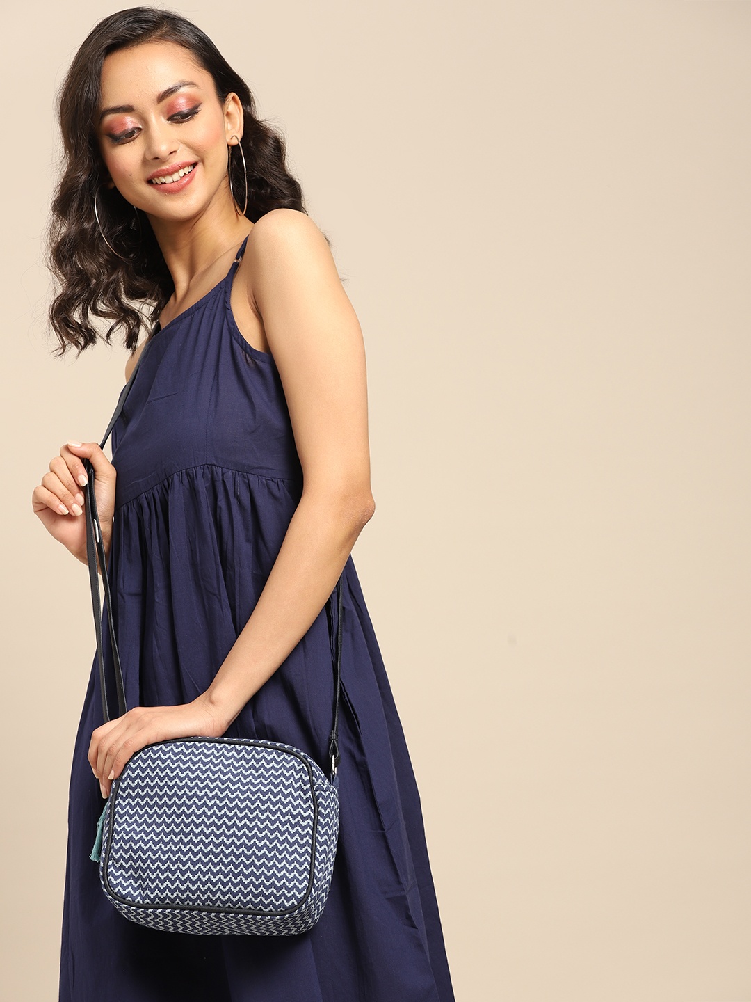 

Anouk Blue Printed Sling Bag with Tassel