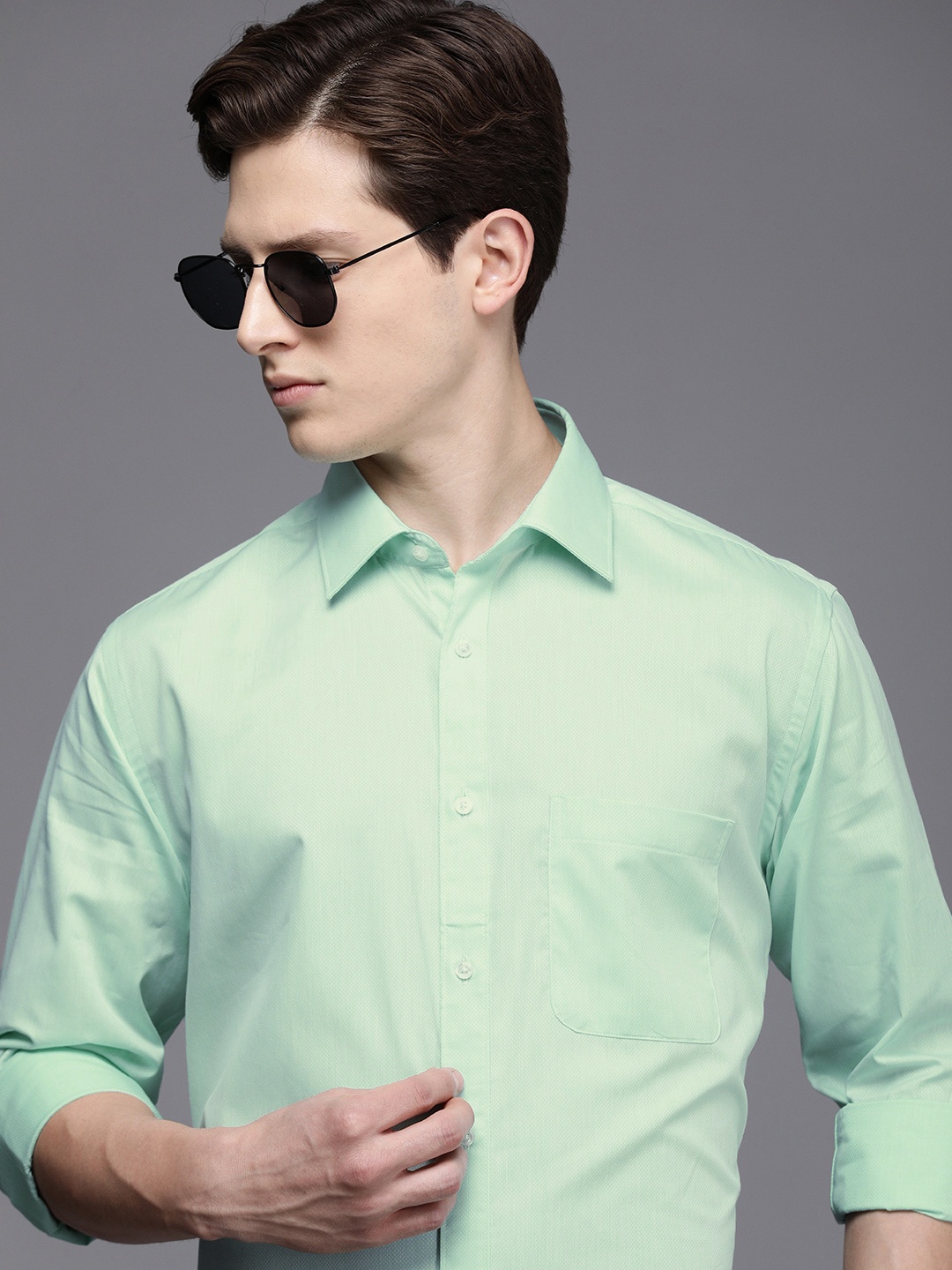 

Raymond Men Green Self Designed Slim Fit Formal Shirt