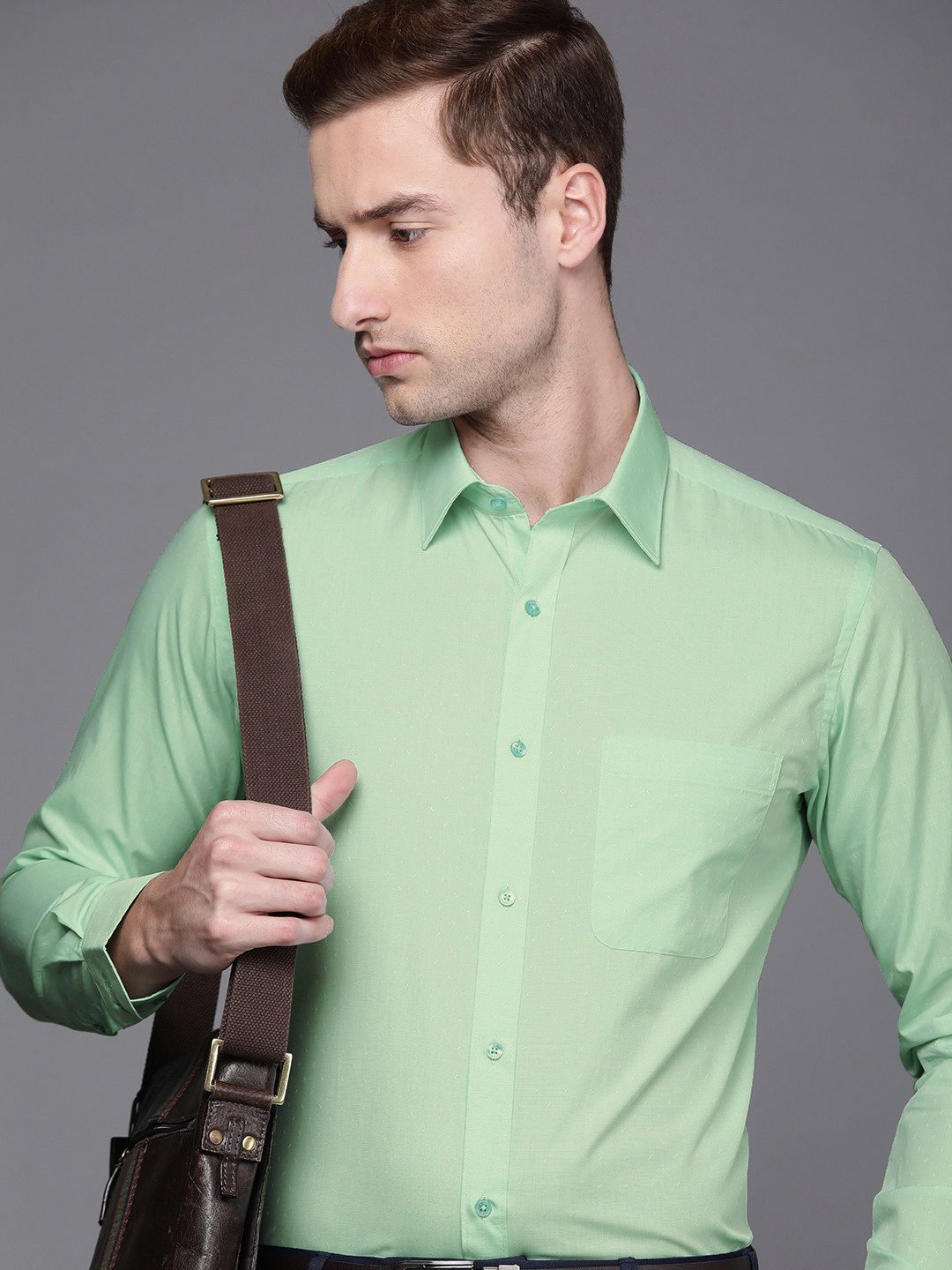 

Raymond Men Green Solid Slim Fit Pure Cotton Formal Shirt