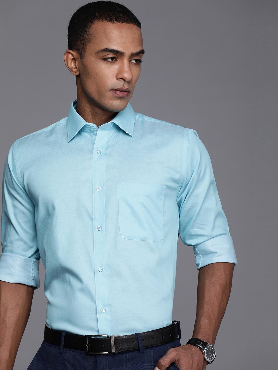 

Raymond Men Blue Self Design Slim Fit Formal Shirt