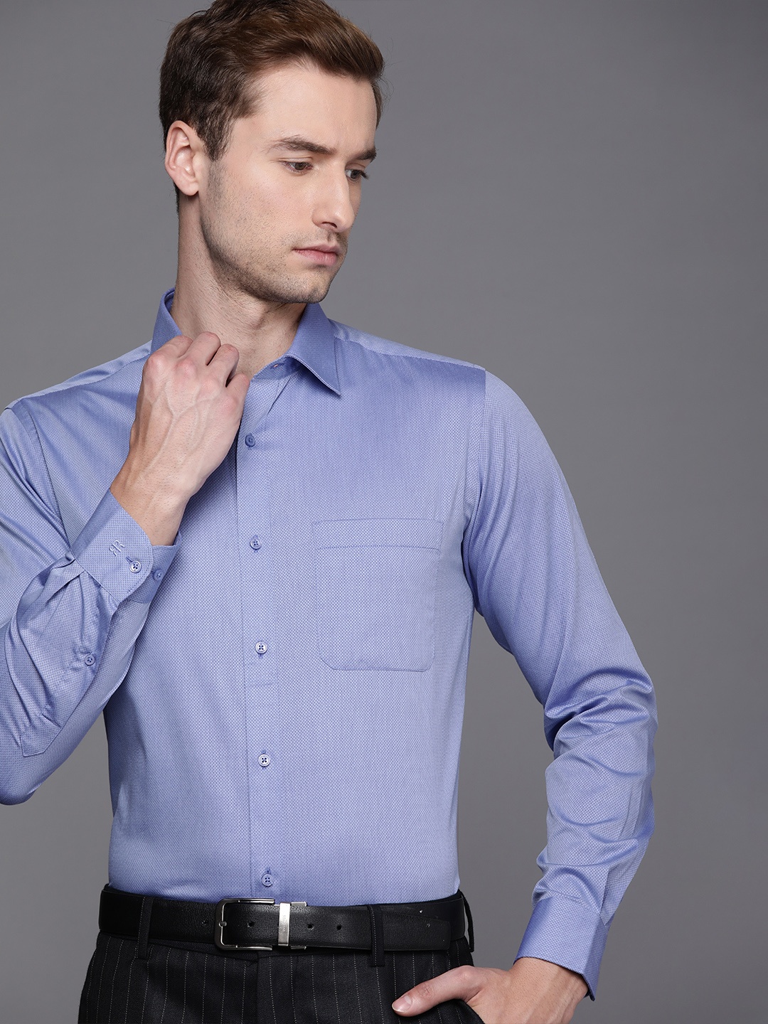 

Raymond Men Blue Self-Design Slim Fit Pure Cotton Formal Shirt