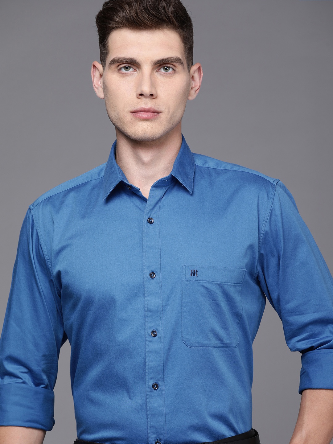 

Raymond Men Blue Solid Slim Fit Formal Shirt