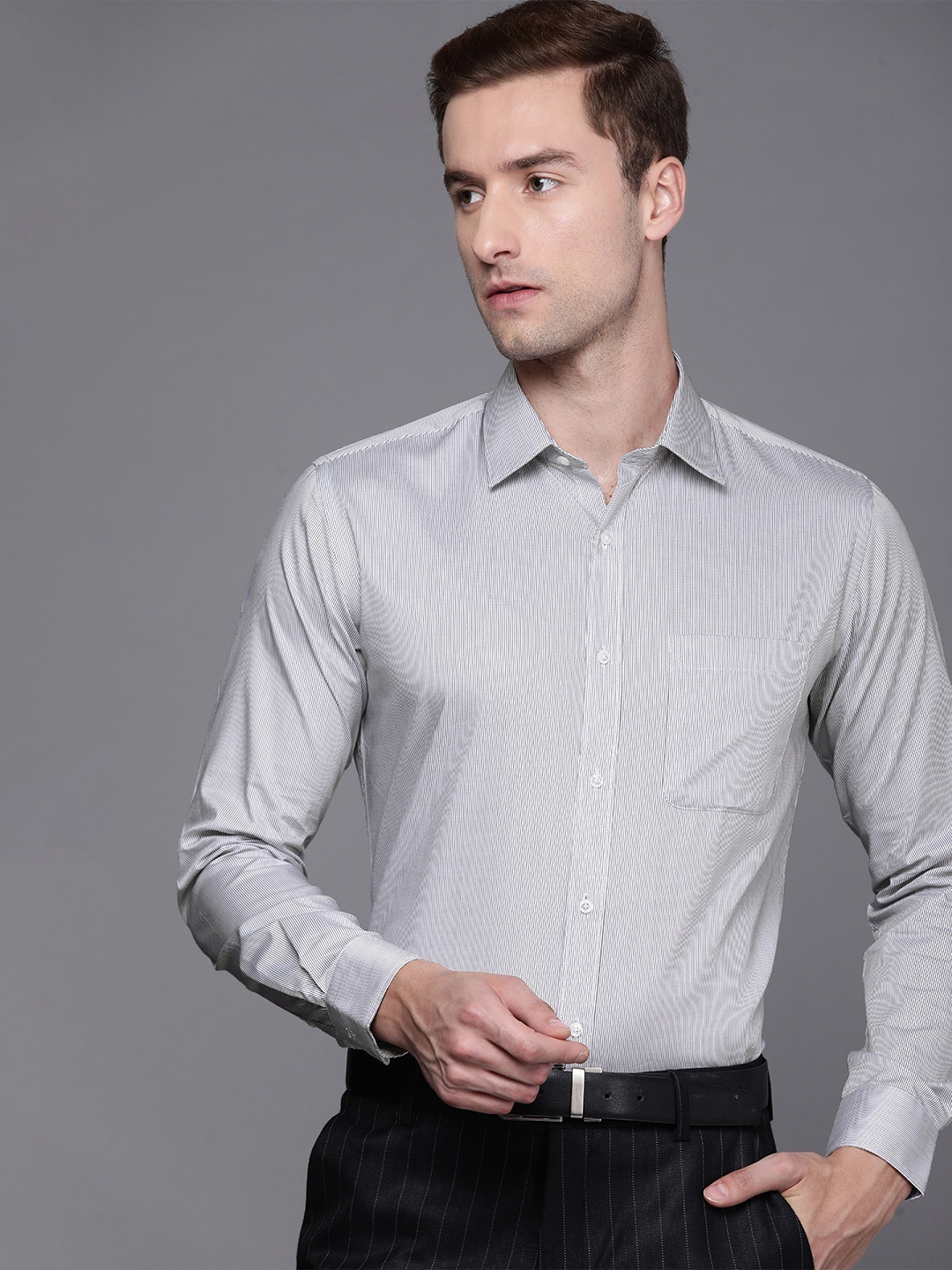 

Raymond Men Off White And Black Slim Fit Pinstriped Pure Cotton Formal Shirt