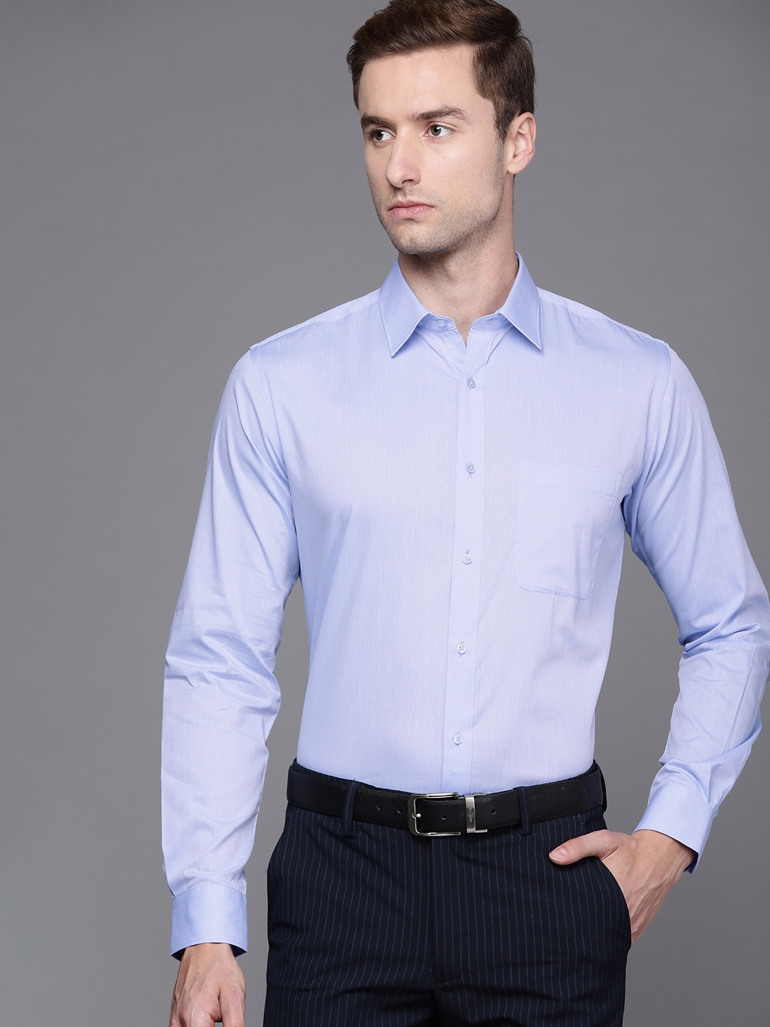 

Raymond Men Blue Self-Design Slim Fit Pure Cotton Formal Shirt