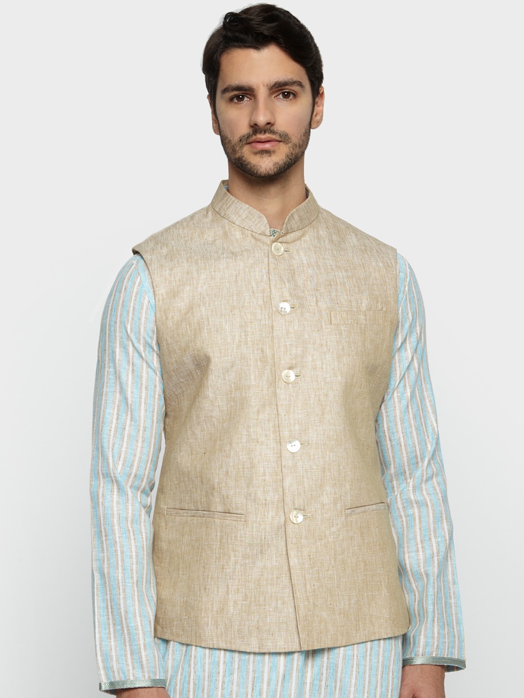 

Ethnix by Raymond Men Beige Solid Woven Nehru Jacket